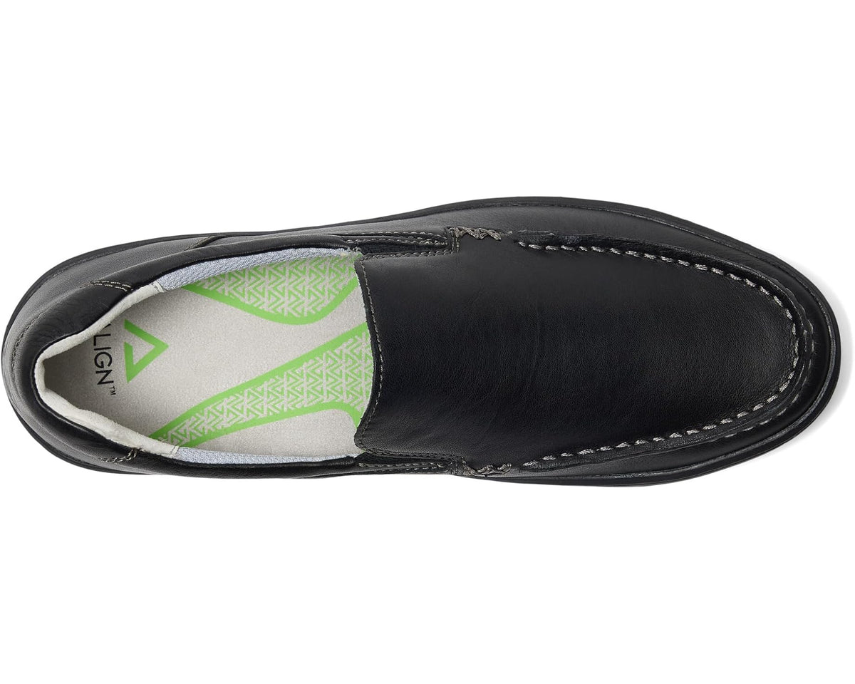 Black loafer top view with green-lined insole and moc stitching opening
