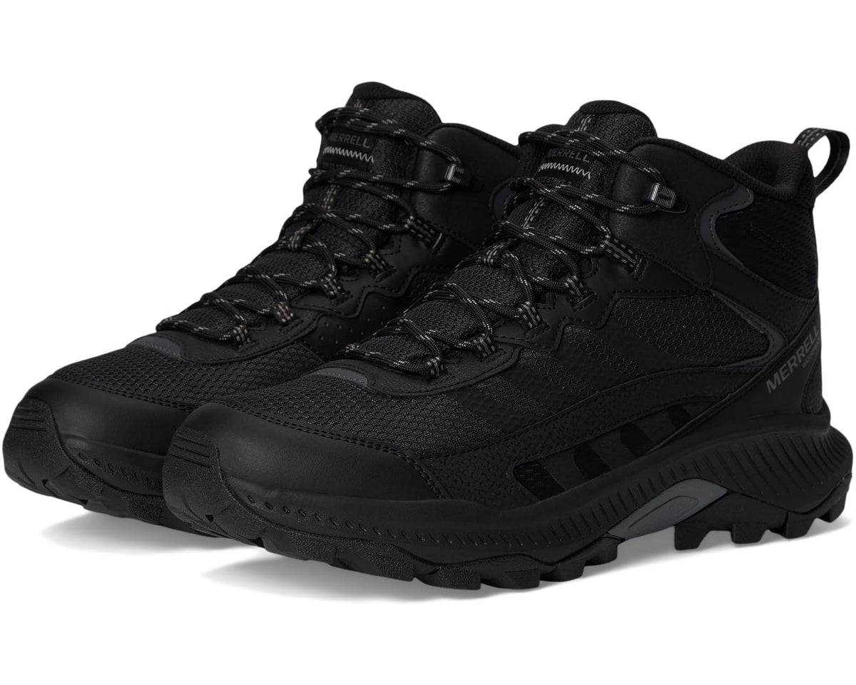 Merrell black mid-top waterproof hiking boot with lace-up closure and side strap