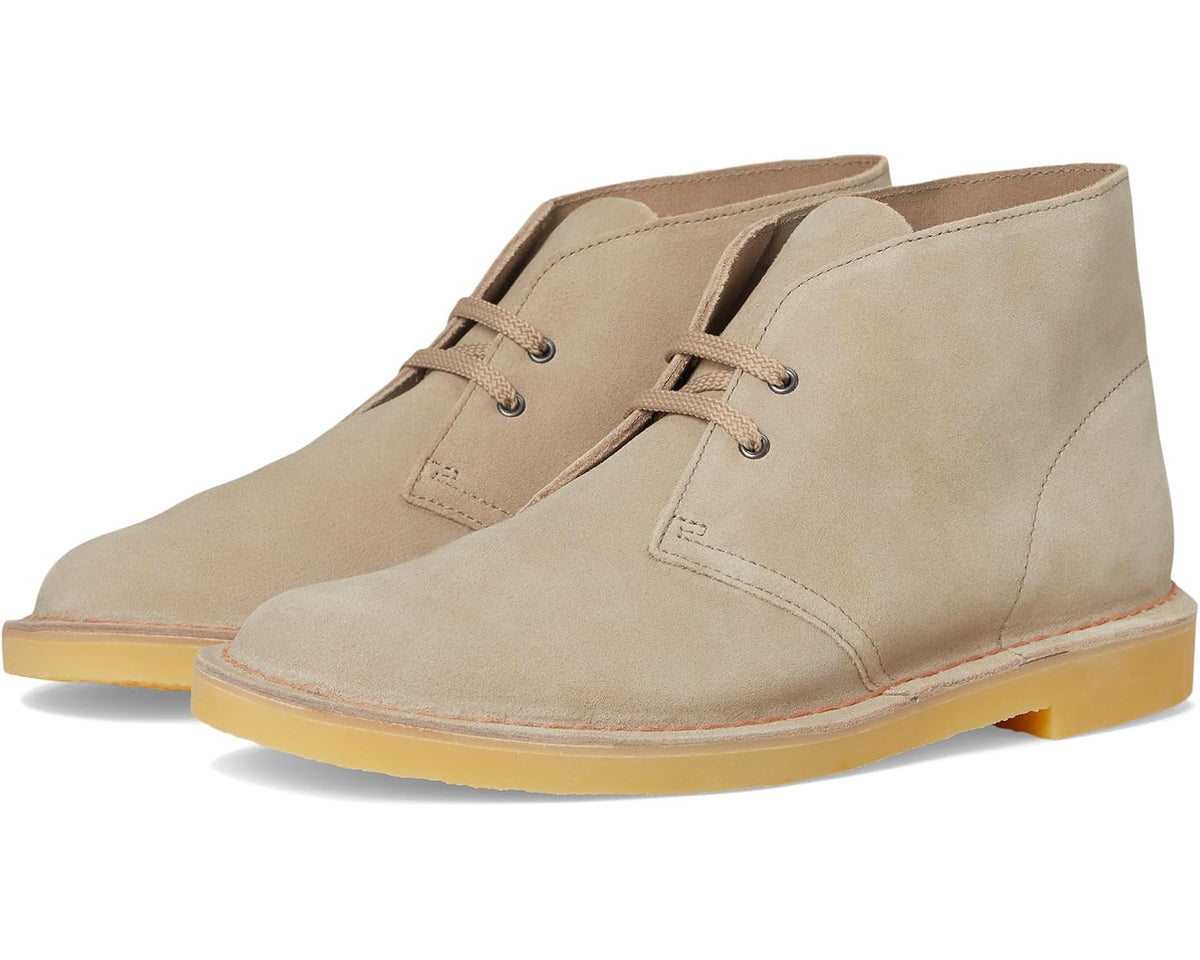 Sand suede lace-up desert boots with chukka collar and contrast yellow sole.