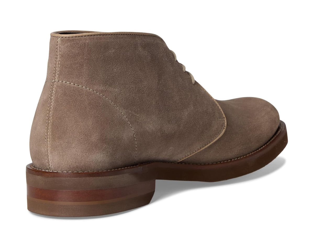 Back view of slate-brown suede chukka boot with stitched heel and dark sole