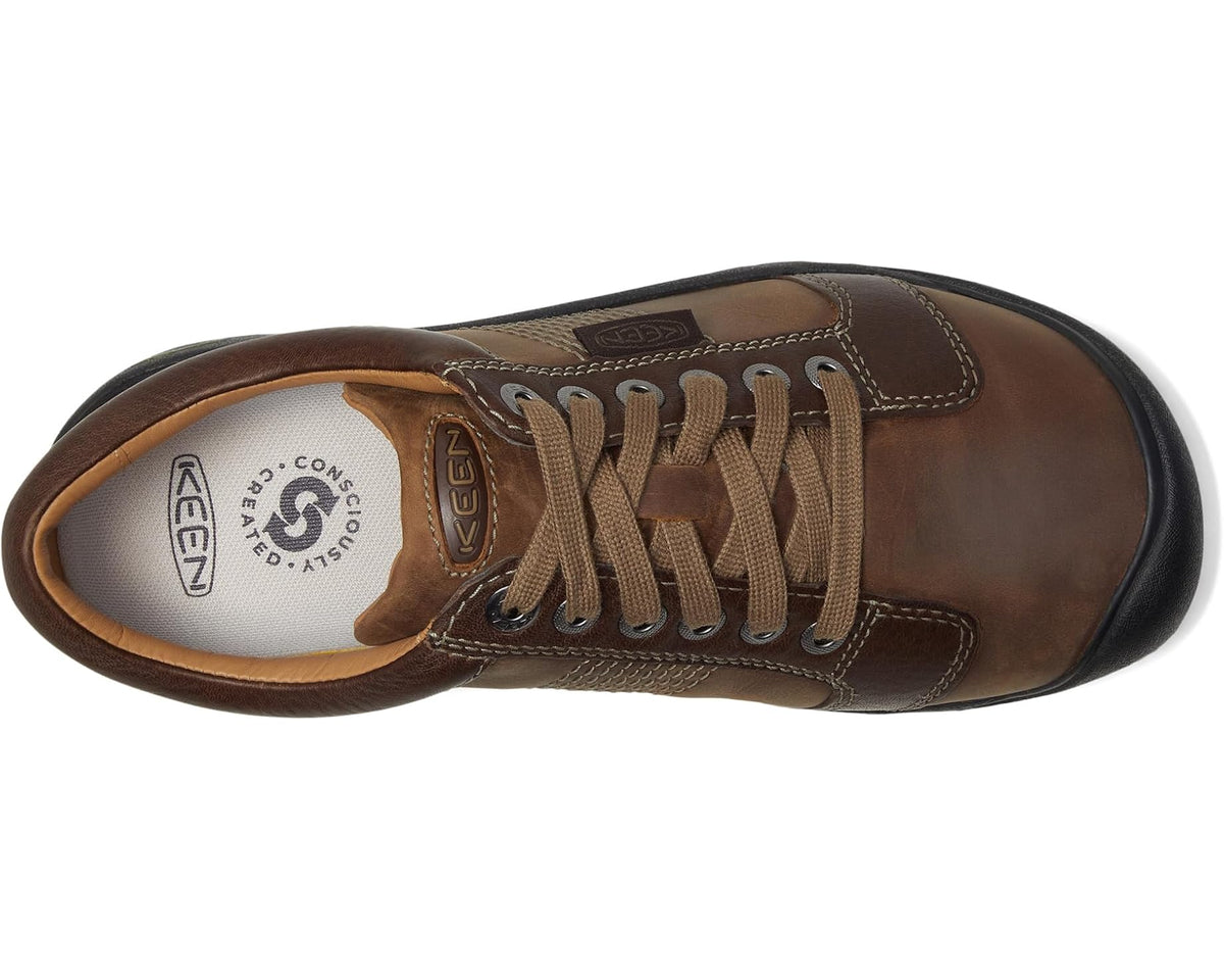 KEEN Austin men's casual shoes, side view with brown laces and logo at tongue