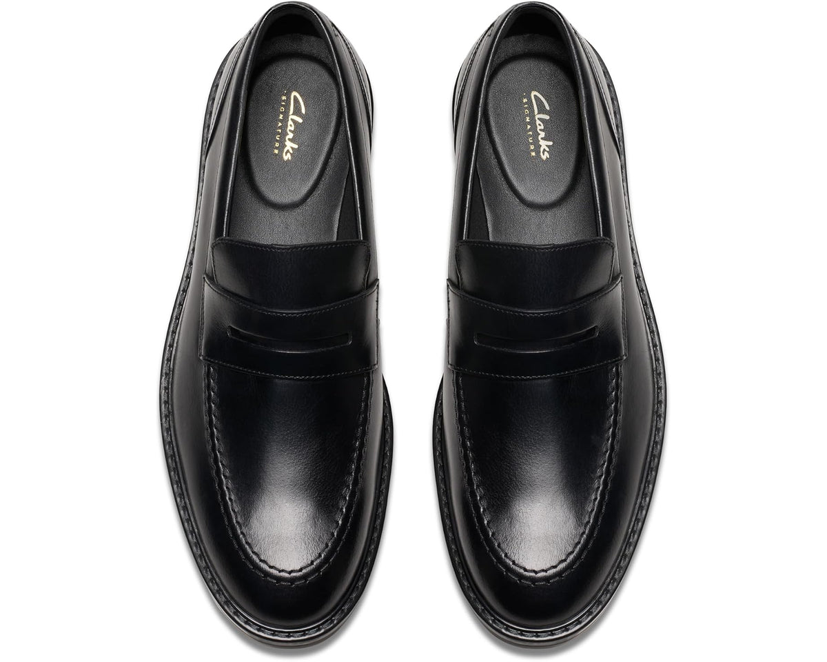 Black leather loafer, front view with apron stitch and slip-on design