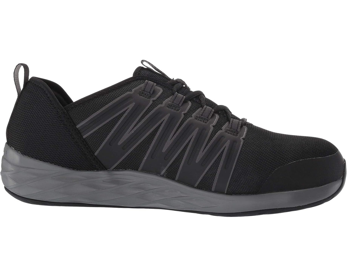 Black lace-up work shoe with dark gray stripe detail and grippy rubber sole