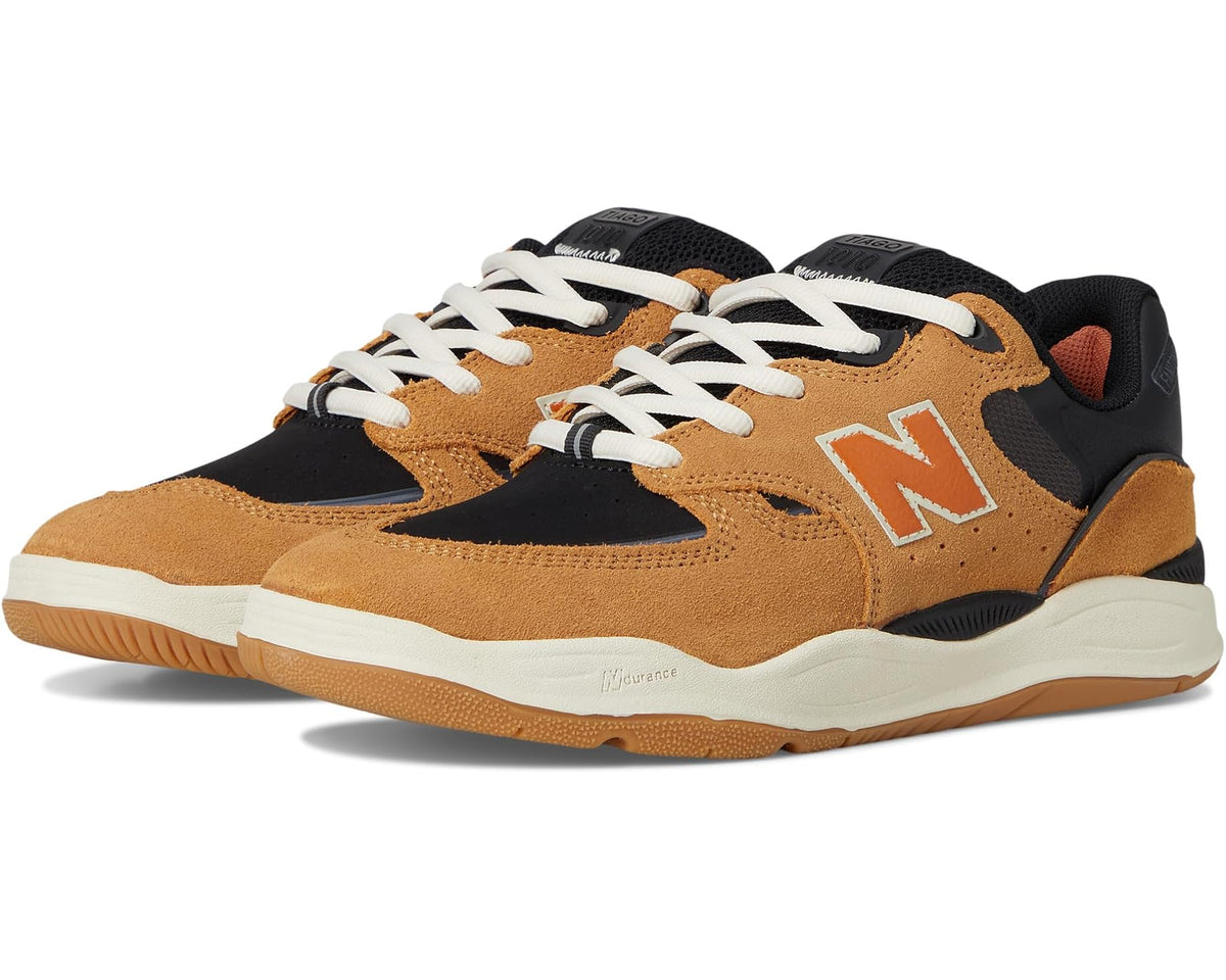 New Balance Numeric 1010 sneakers in camel suede with black panels, orange trim, white laces