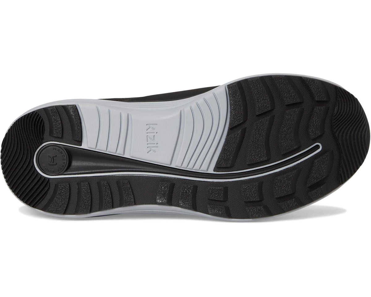 Black rubber outsole with deep tread pattern and light-gray midfoot section