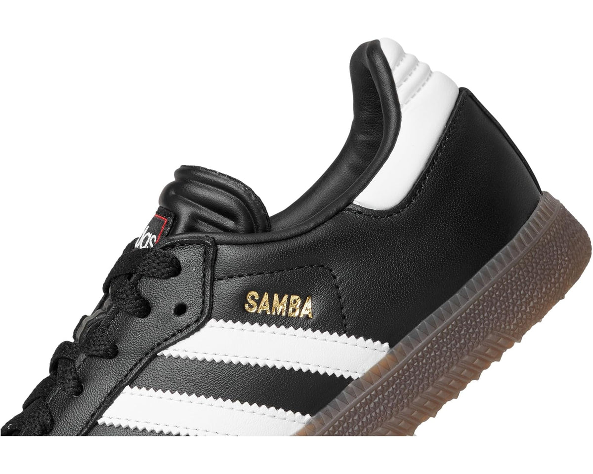 adidas Samba indoor soccer shoe close-up, black upper with white stripes and lace panel
