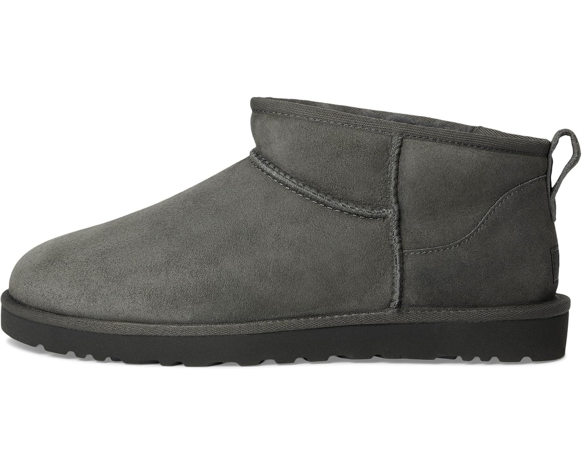 Dark gray suede pull-on ankle boot with stitched collar and sole