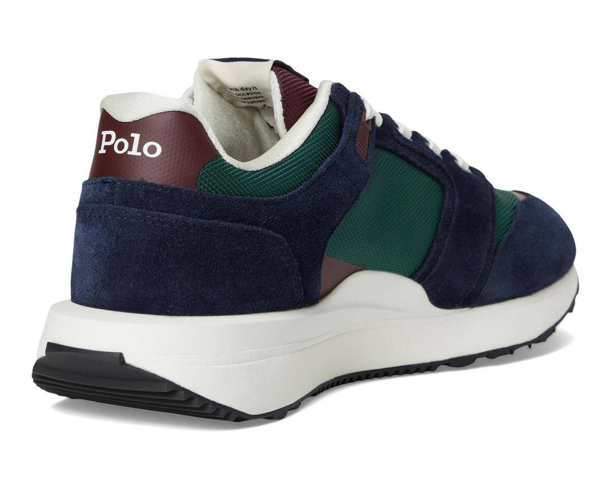 Rear view sneakers with navy suede, green and maroon heel, cushioned collar.