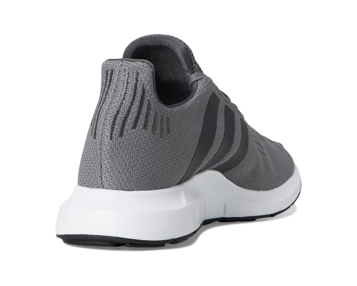 Men's grey adidas running sneakers with knit heel panel and white cushioned sole