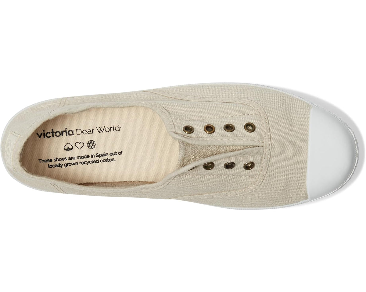 Women's beige canvas sneakers, side view with brand logo on insole