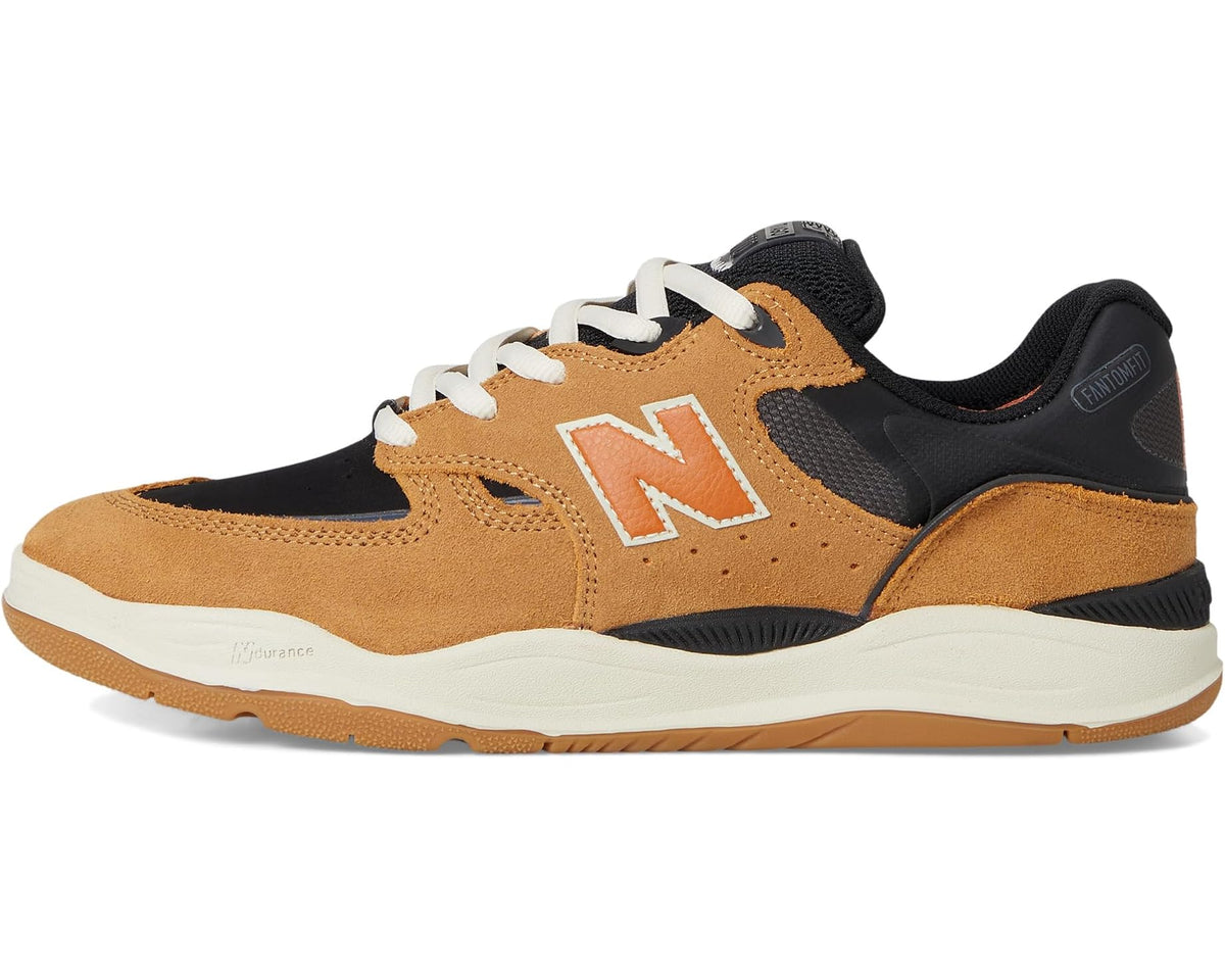New Balance Numeric 1010 sneakers, low-top side view in camel suede with black and orange