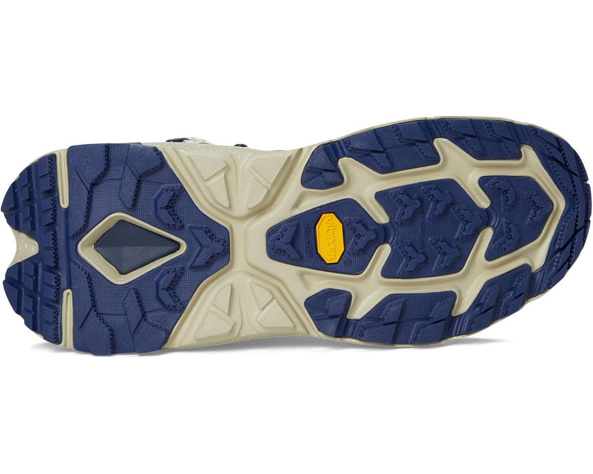 Men's hiking boot outsole with blue tread and beige undersole