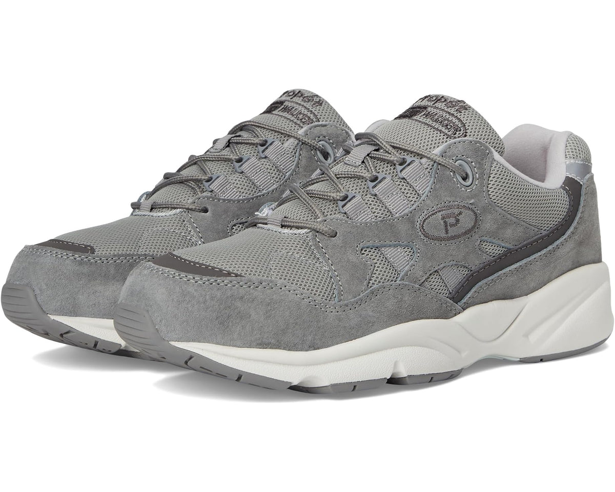 Men's grey athletic sneakers with lace-up front and white midsole