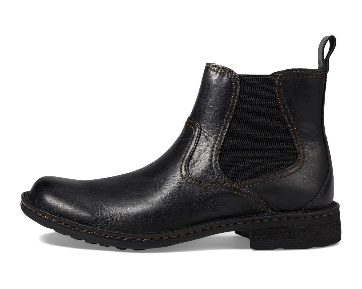Black leather Chelsea boot with elastic side panel, stitched toe, and block heel
