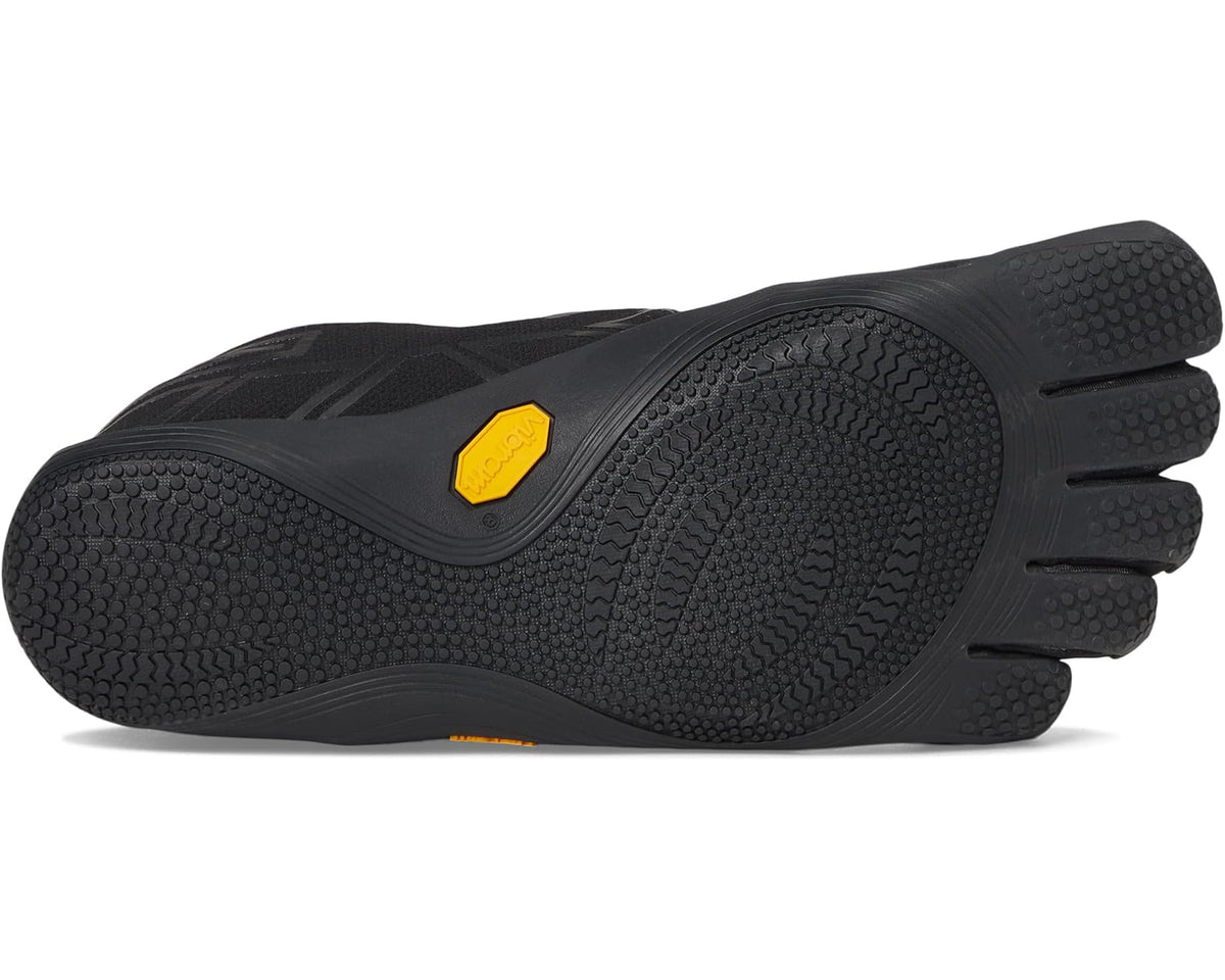 Black Vibram Groundplay outsole with grippy tread and yellow logo detail