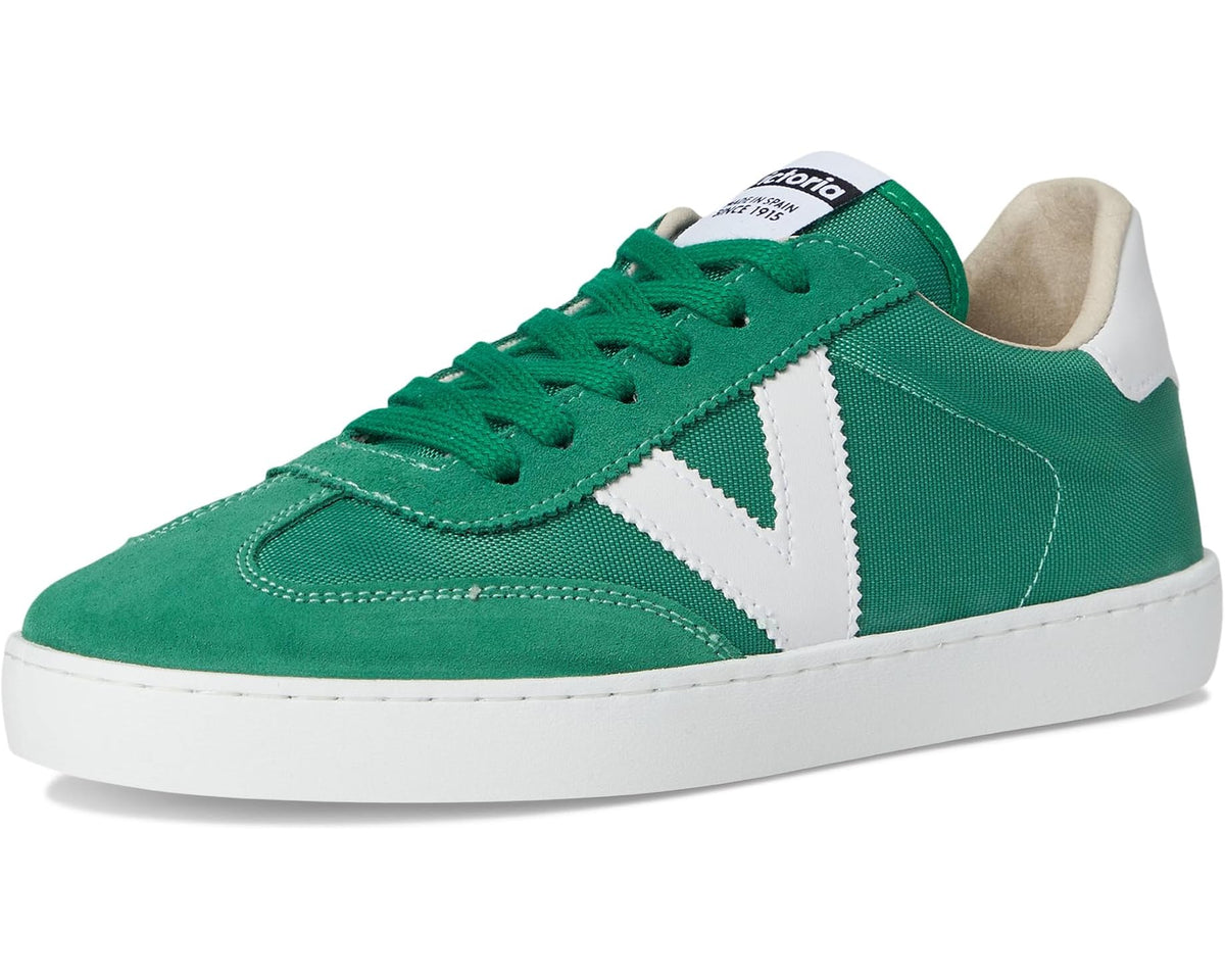 Green suede and nylon sneakers with white V stripe, green laces, and low sole