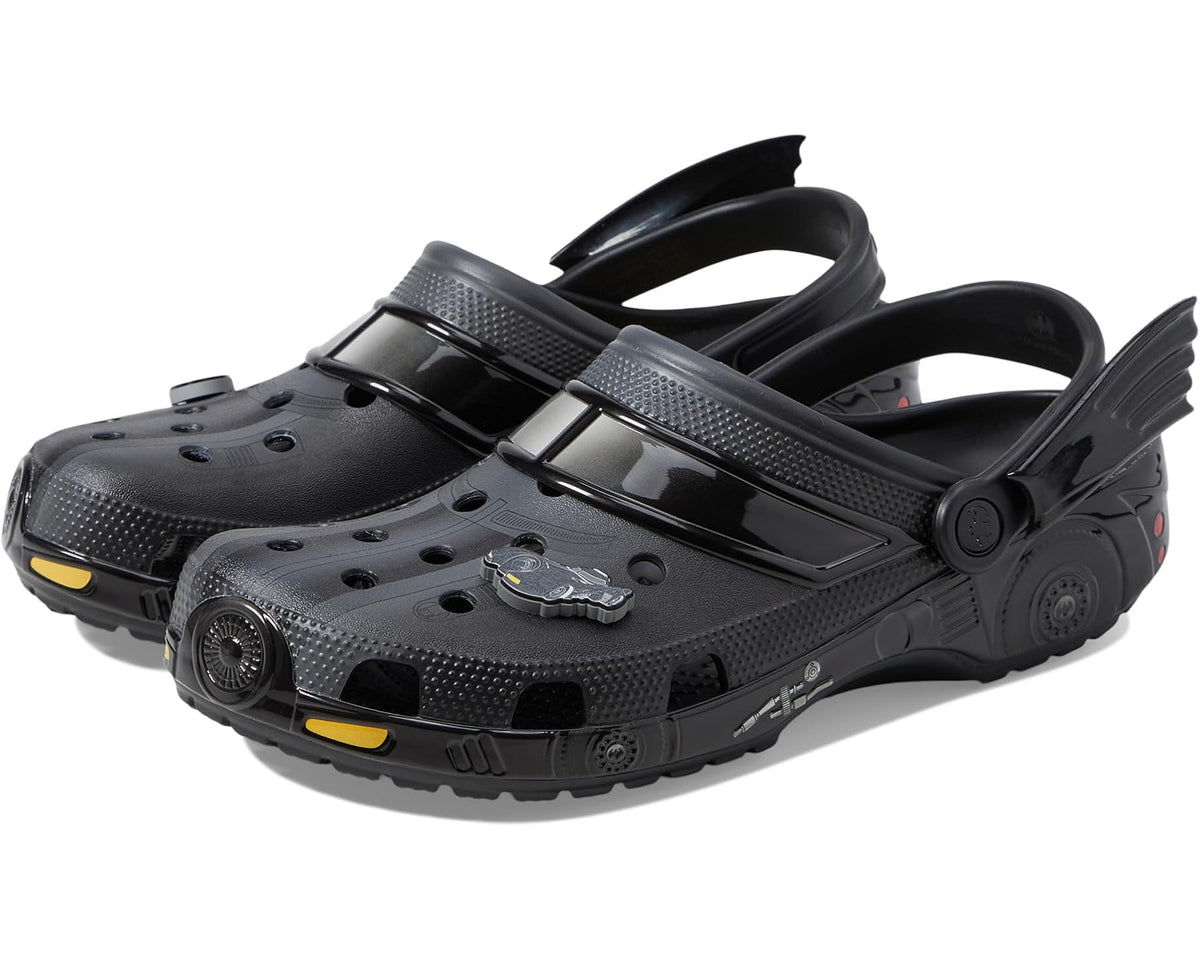 Unisex black adjustable clogs with molded character graphics and buckle strap