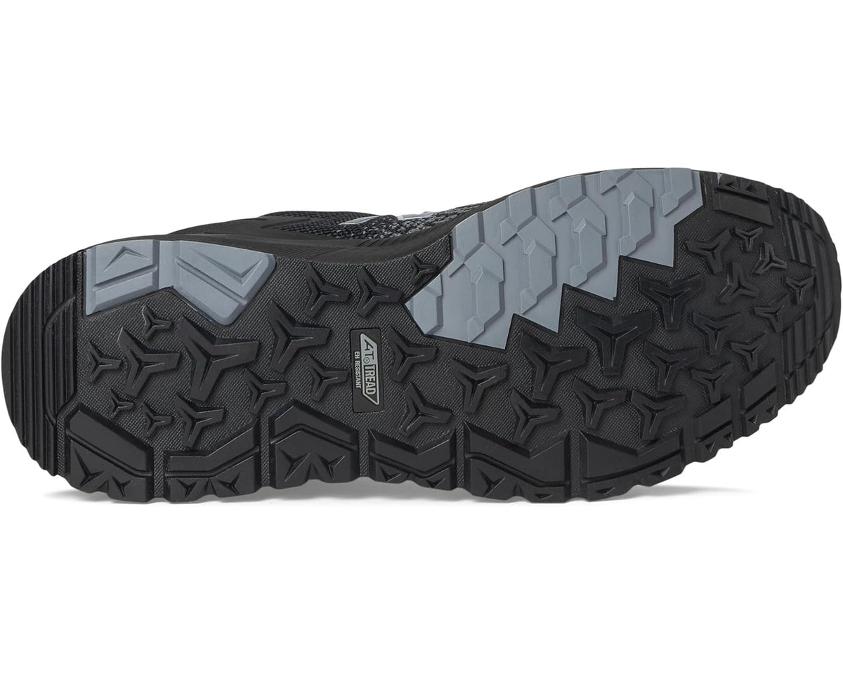 Black rubber outsole with deep tread for traction on a safety-toe work shoe
