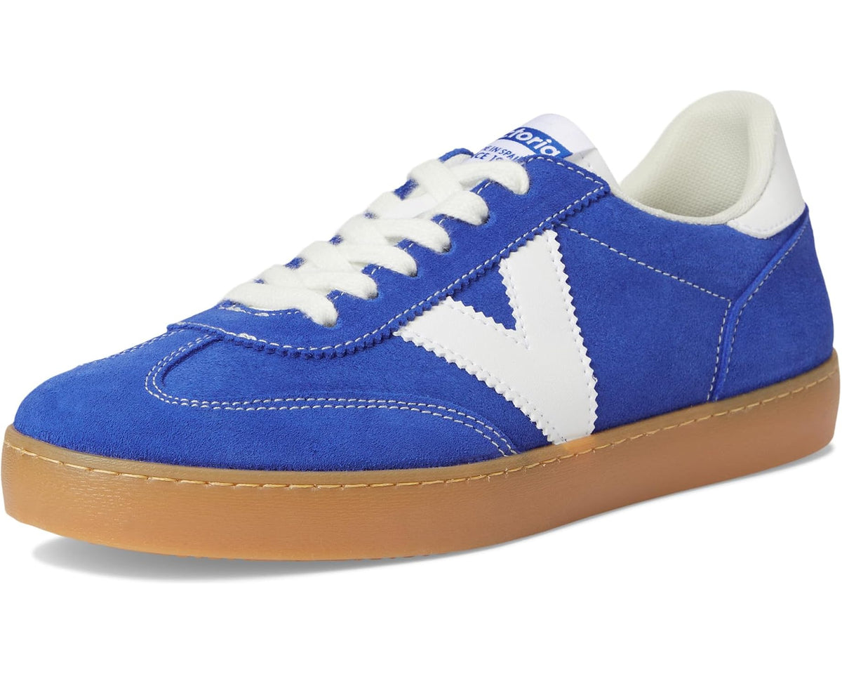 Royal blue suede lace-up sneakers with white star stripe and tan gum sole