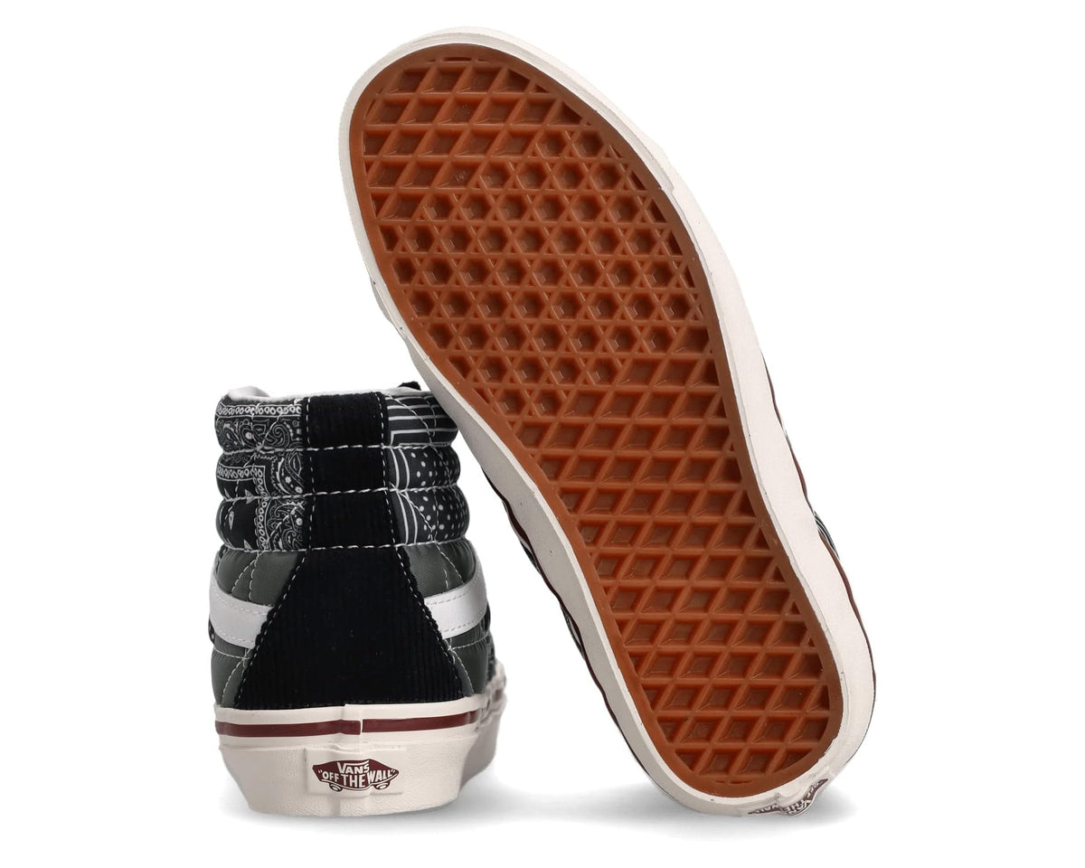 High-top sneaker outsole with brown waffle tread and black quilted heel