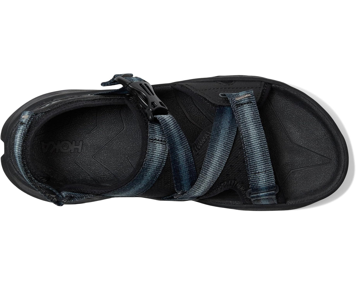 Men's Hoka Infini Hike TC trail sandal, side view with black footbed and blue straps