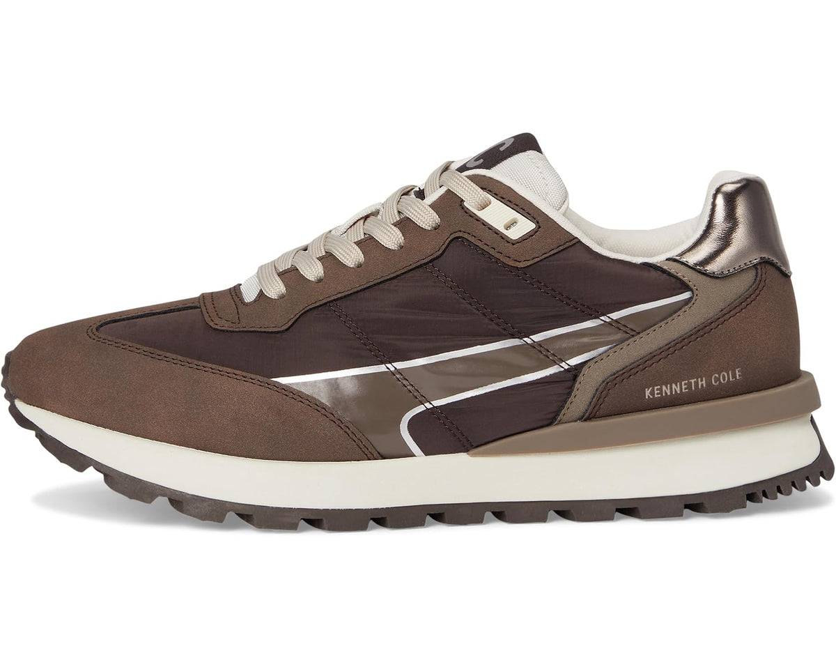 Runner-style sneaker in dark brown with cream accents, lace-up front quarter view