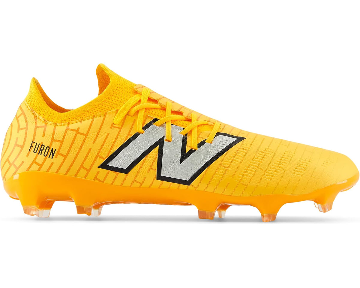 Yellow lace-up soccer cleats with New Balance logo and FURON branding on upper