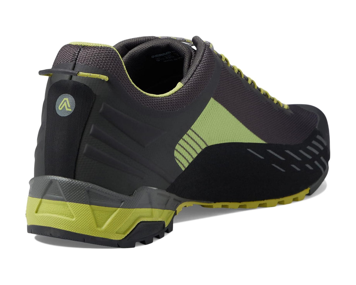 Men's hiking shoe heel and side, cushioned collar with green trim and molded rubber