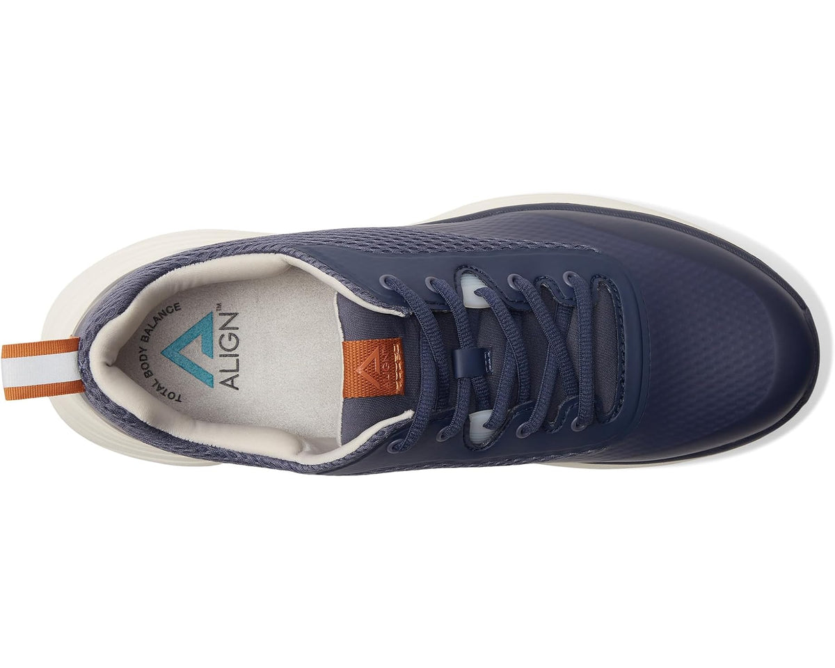 Men's washed indigo lace-up sneakers showing mesh tongue lining and orange heel strap