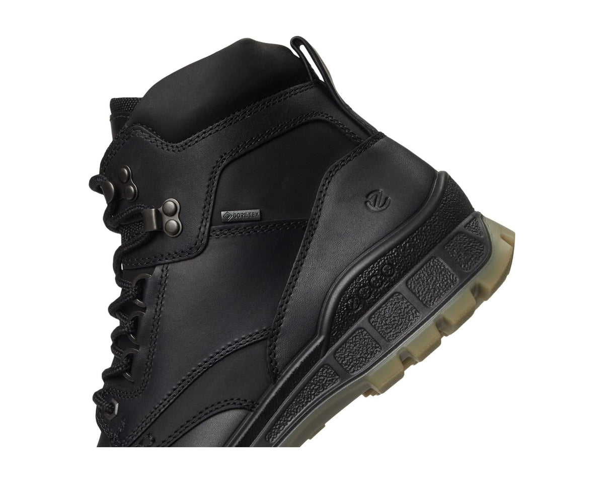 ECCO GORE-TEX black boot close-up, textured side panel and lace hardware.