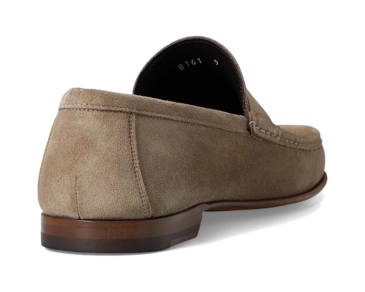 Taupe suede loafer heel and back panel with cushioned collar
