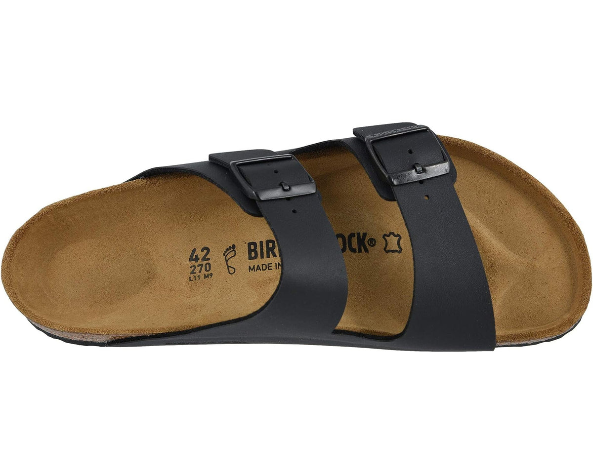 Birkenstock Arizona black slide sandals with cork-look footbed and two buckled straps