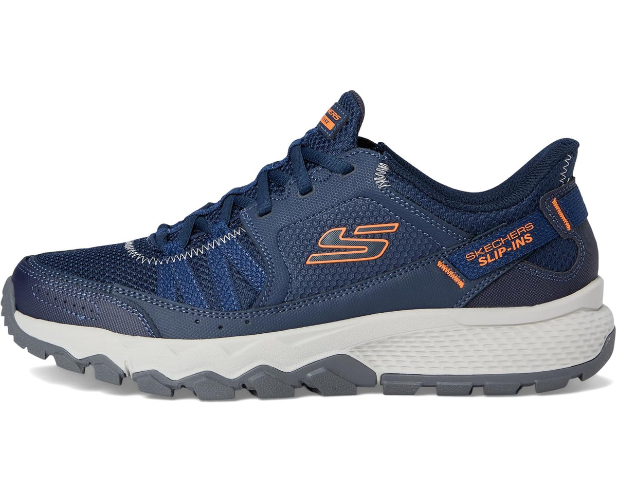 Navy slip-in athletic shoe with orange accents, mesh panels, and lace-up look