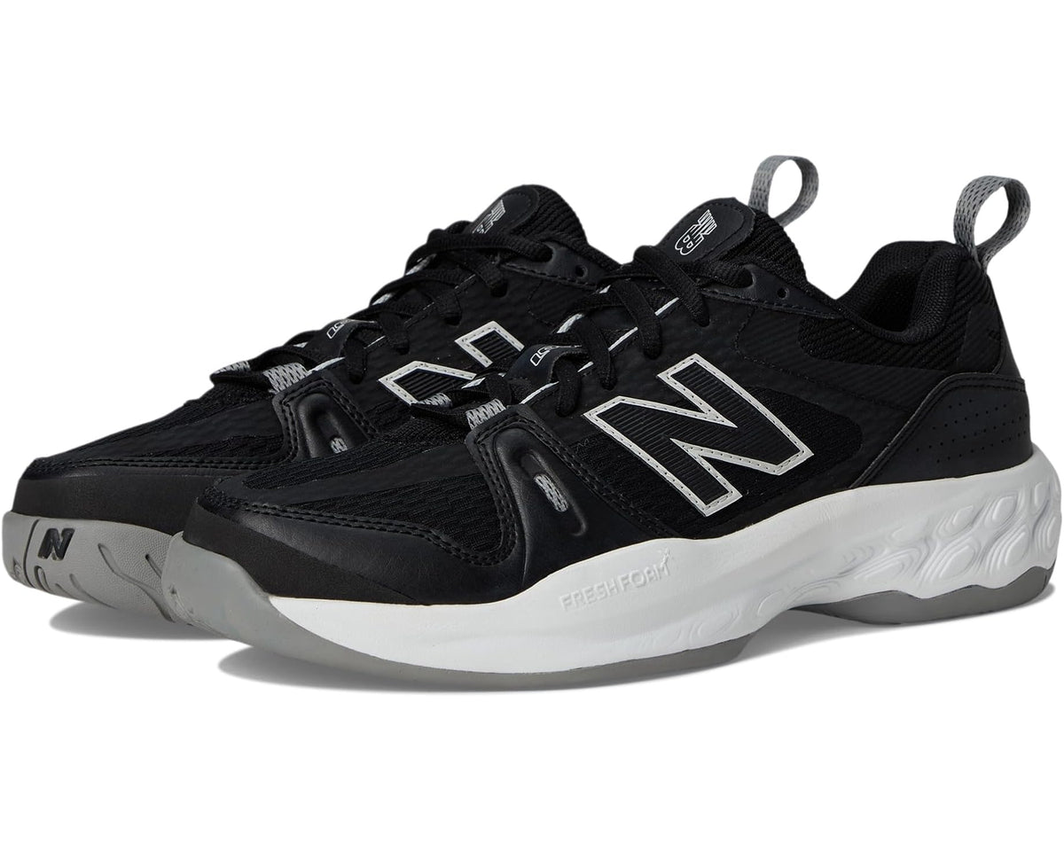Black lace-up New Balance tennis shoe, Fresh Foam white midsole, silver N logo