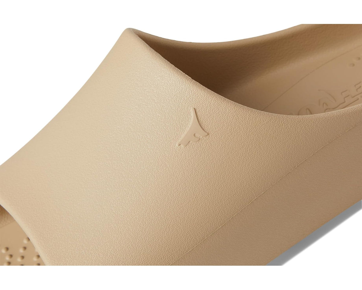 Warm sand slide sandal close-up with subtle logo on upper