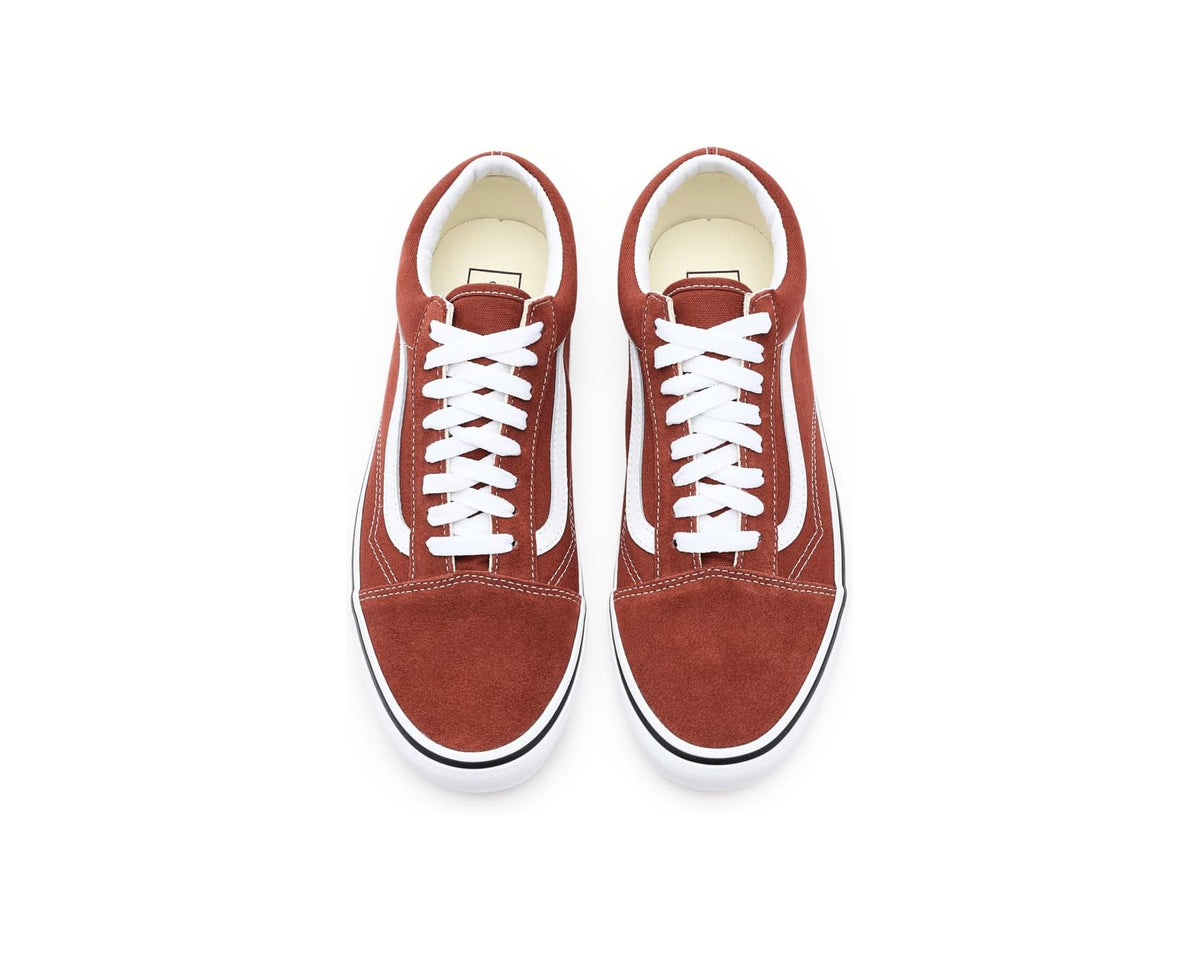 Pair of rust bronze Vans Old Skool sneakers with white laces and toe caps