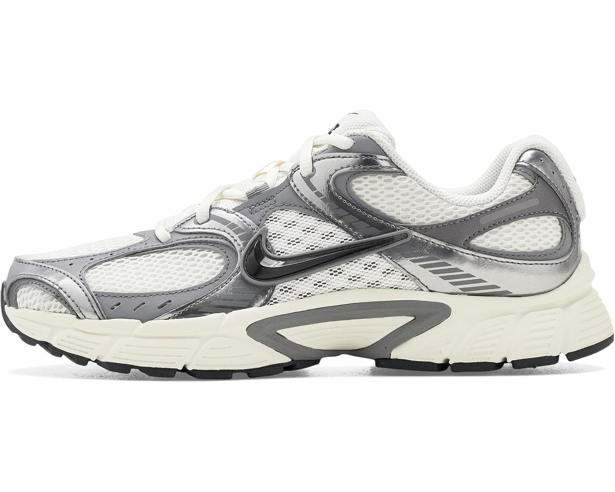 Men's Nike V5 runner with light gray mesh, hooked strap accents, and cream sole