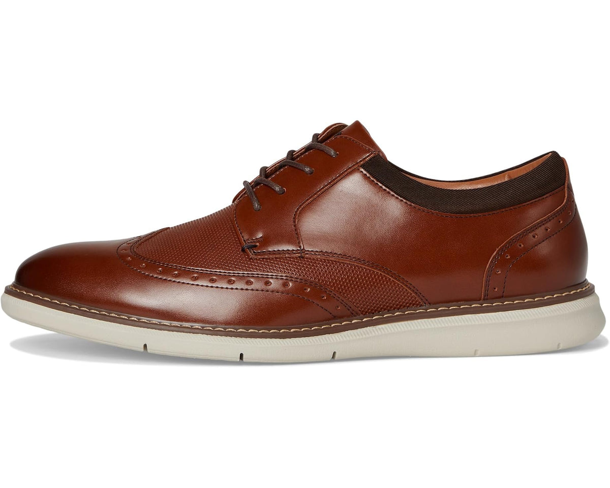 Men's cognac lace-up oxford with wingtip stitching and low-profile rubber sole
