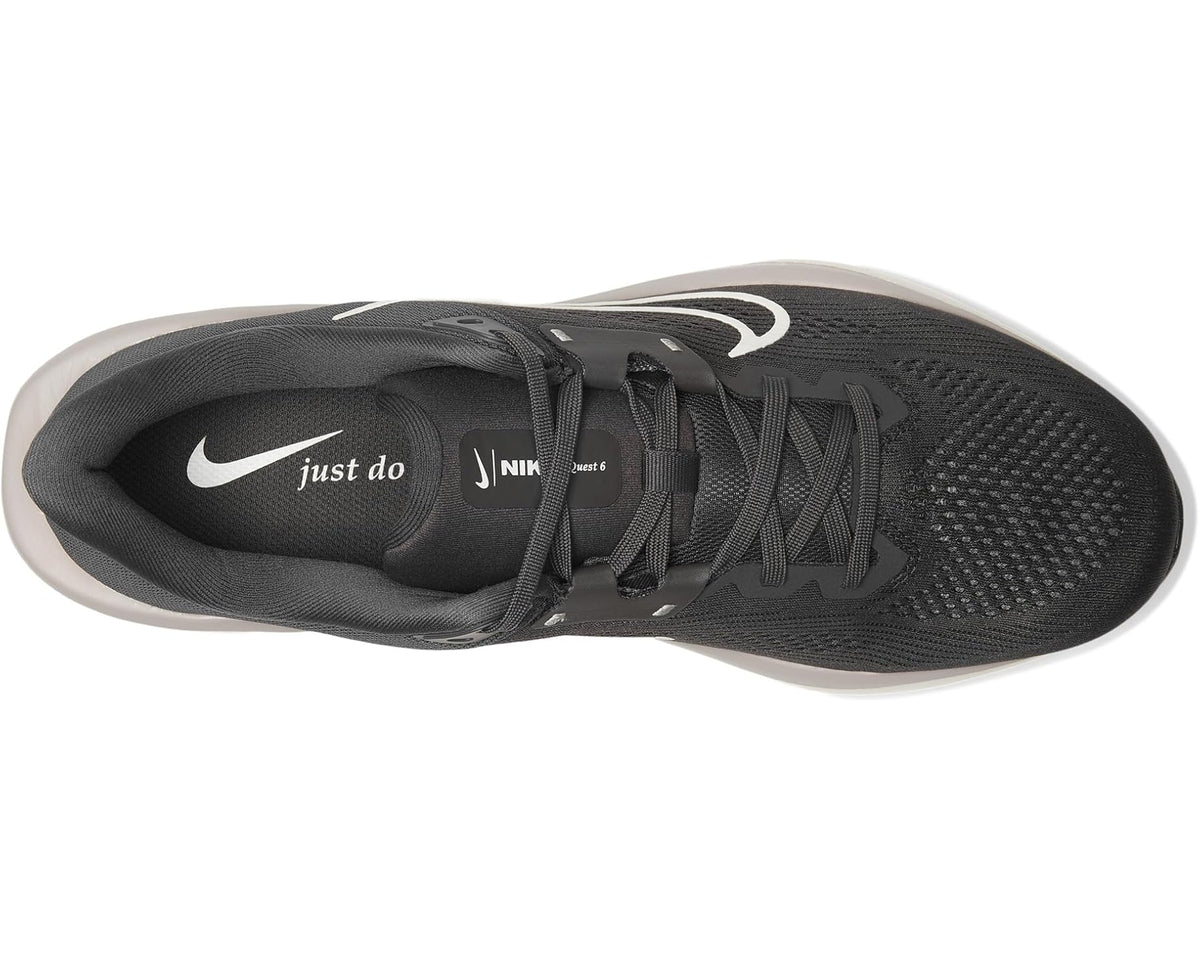 Men's black running shoes, lace-up with white Nike swoosh on upper.