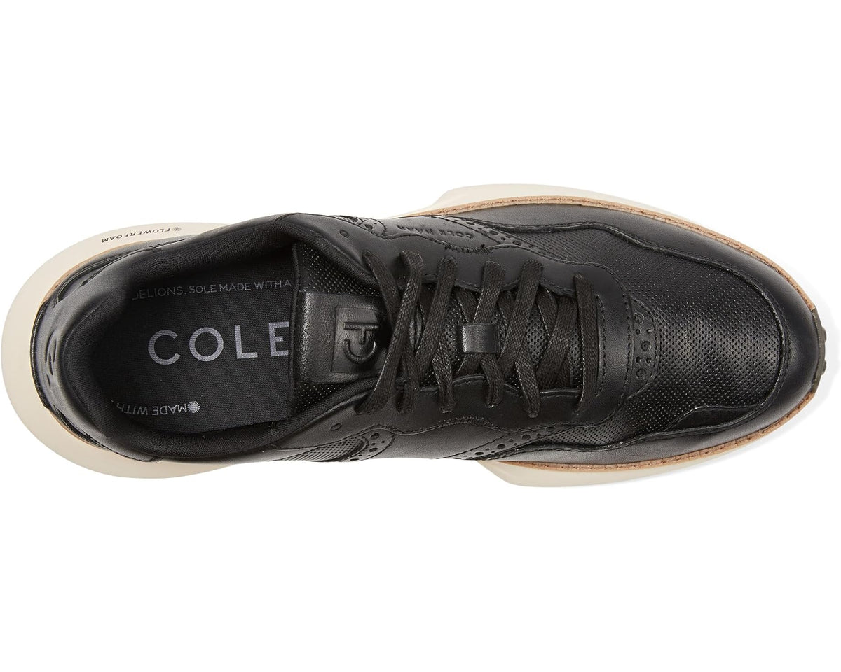 Men’s black lace-up sneaker with textured upper and ivory-trimmed sole edge