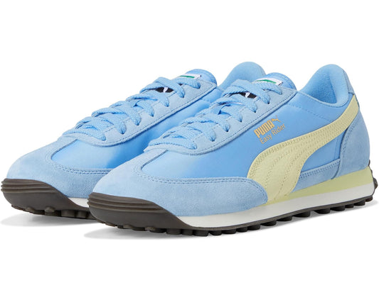 Women's blue suede lace-up sneakers with pale gold side stripe and dark rubber sole
