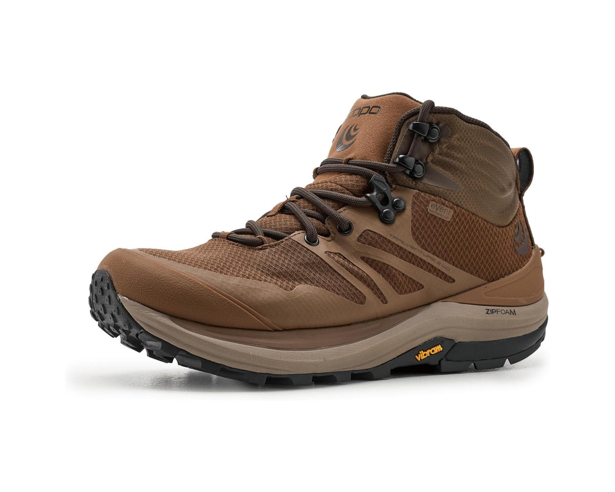 Brown and tan high-top hiking boots with laces and thick trail tread sole