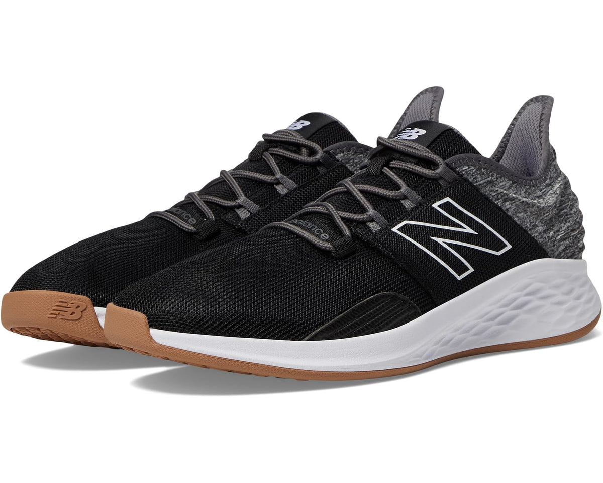 Black New Balance golf sneaker with white Fresh Foam sole and gum outsole