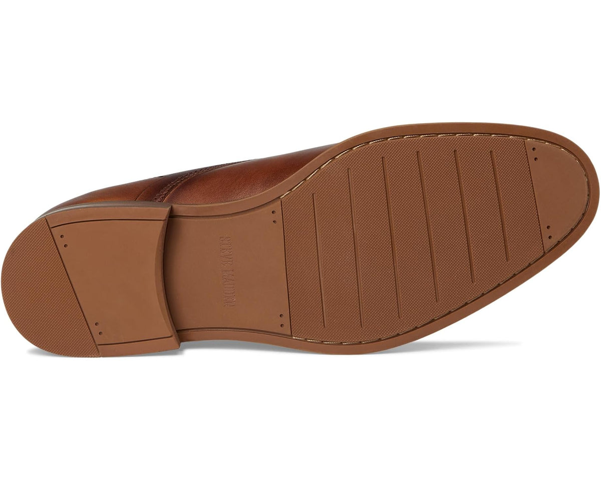 Tan leather chukka boot outsole and heel tread view