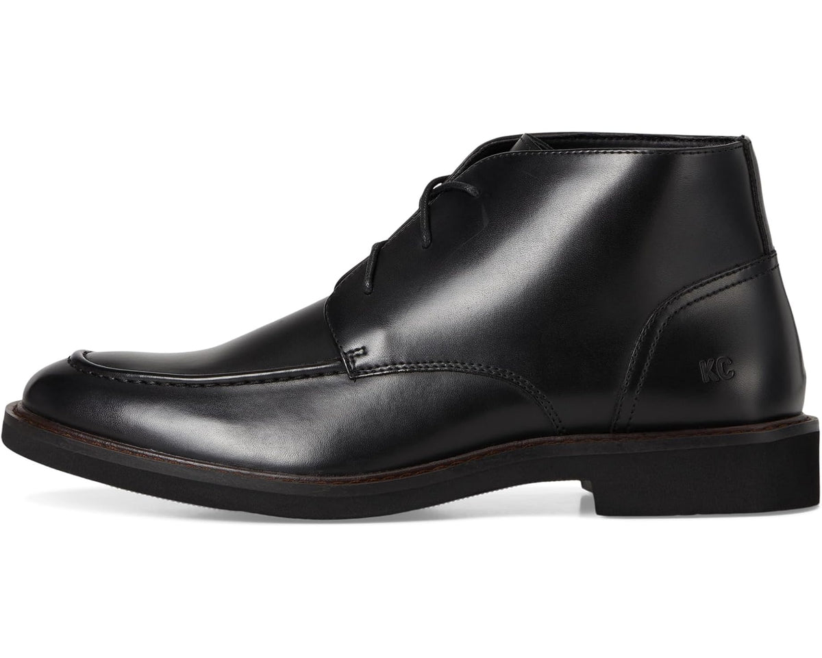 Black lace-up leather ankle boot side profile with pull tab and stitching