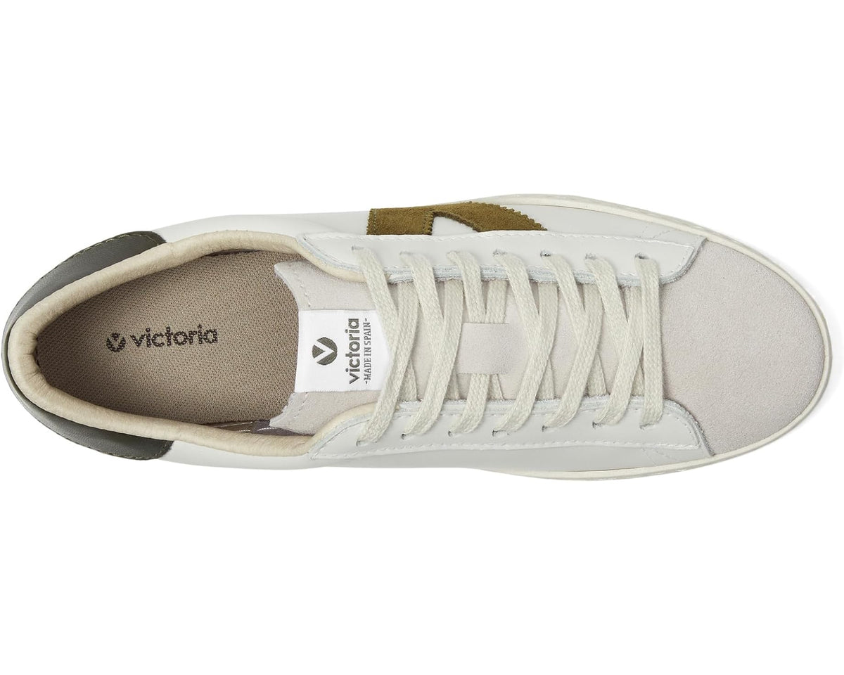 Unisex leather low-top sneakers, side view with khaki triangle and dark green heel