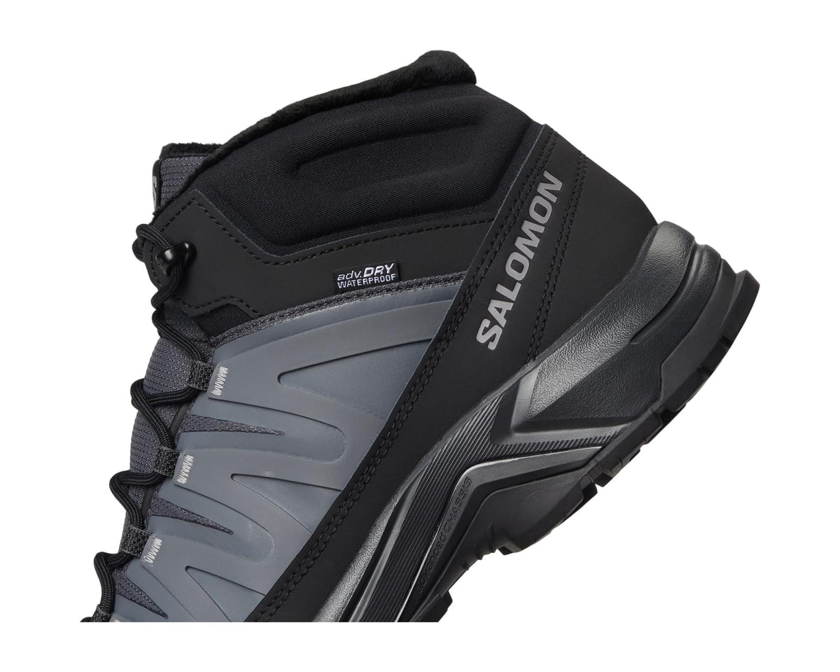 Men's Salomon boot close-up, water-resistant lining, black and gray trim