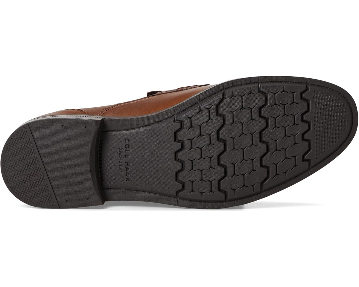Men's brown penny loafers with textured rubber outsole