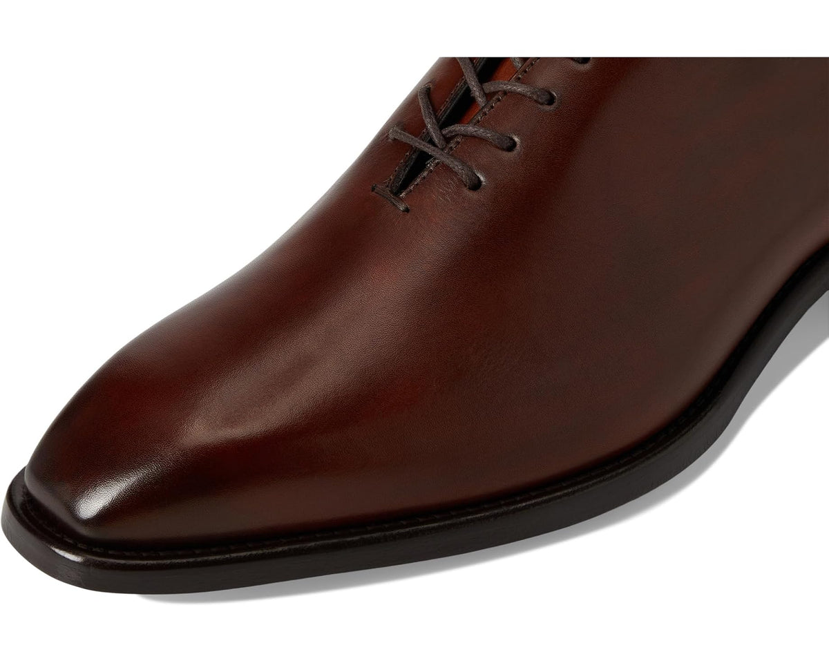 Men's mahogany leather upper with lace-up closure, close-up view