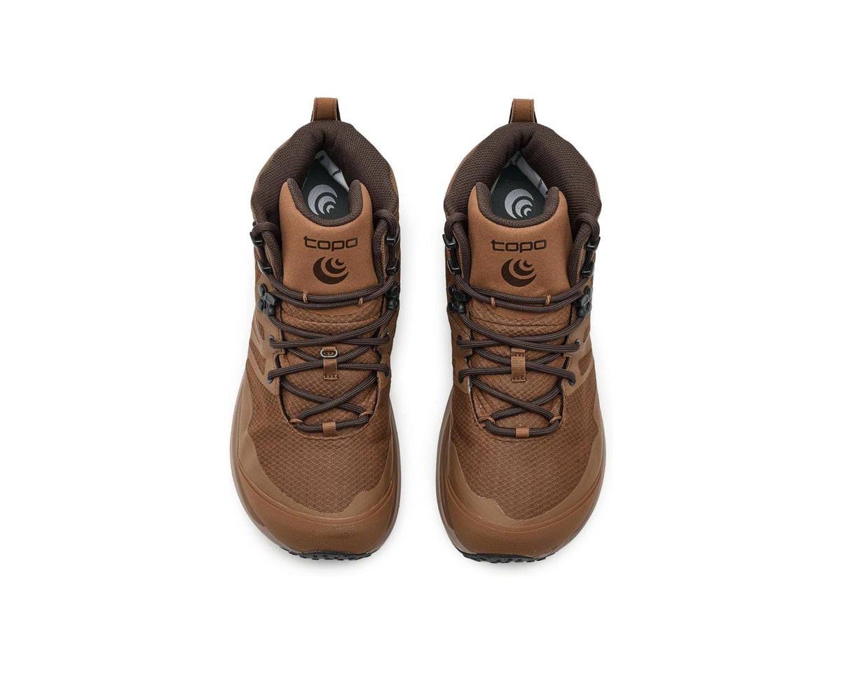 Pair of brown and tan high-top boots with dark laces and padded collars